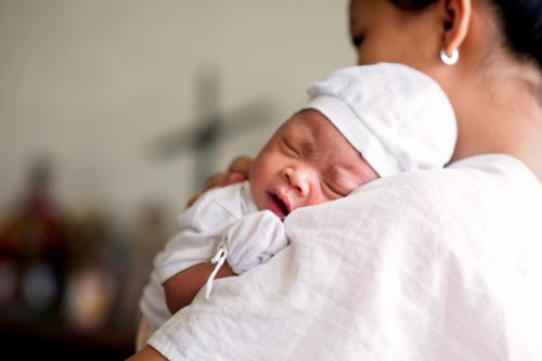 A single mom from Nazareth Home with her baby