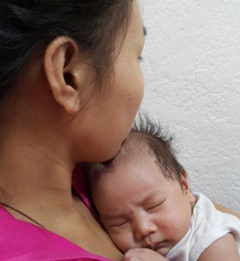 A Single Mother from Nazareth Home with her baby